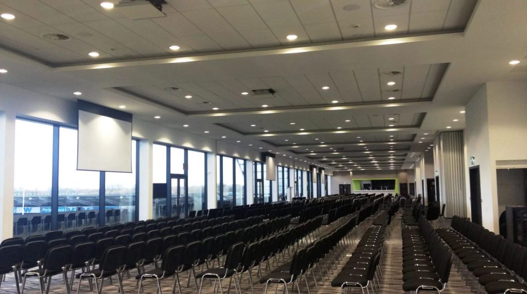 Inside the suite set out as a conference theatre layout overlooking the pitch