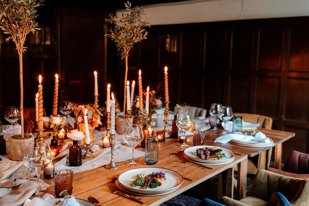 Table set with place settings and food for a Christmas Party Night. 