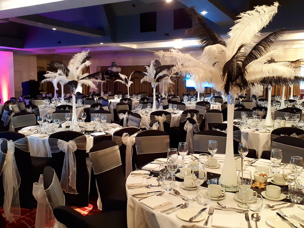 Image of an event room set up for a party. 