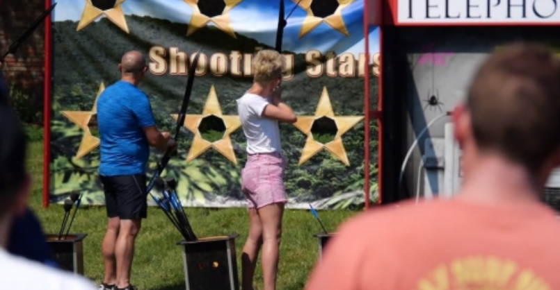 Image of people taking part in a team building activity. 